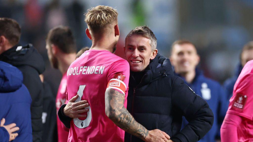 Kieran McKenna hugs Luke Woolfenden