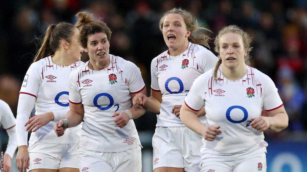 Liz Crake playing for England, with Zoe Aldcroft, Sarah Hunter and Holly Aitchison