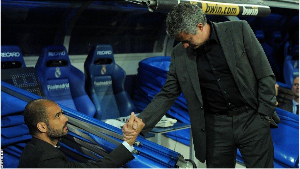 Guardiola shakes hands with Jose Mourinho before La Liga match between Real Madrid and Barcelona at Estadio Santiago Bernabeu on April 16, 2011.