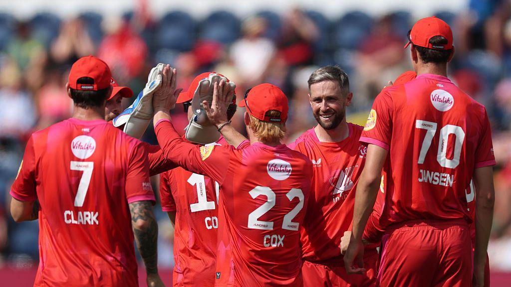 Chris Woakes and his Welsh Fire teammates celebrating during their loss to London Spirit at Sophia Gardens.