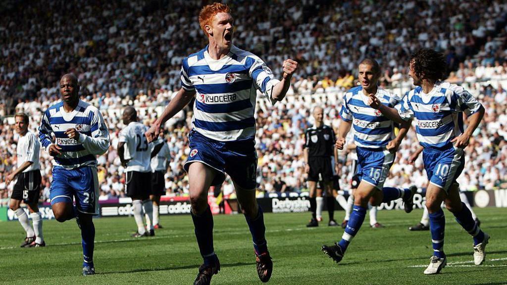 Dave Kitson, with a clenching fist, wheels away after a scoring against Derby County in May 2008 