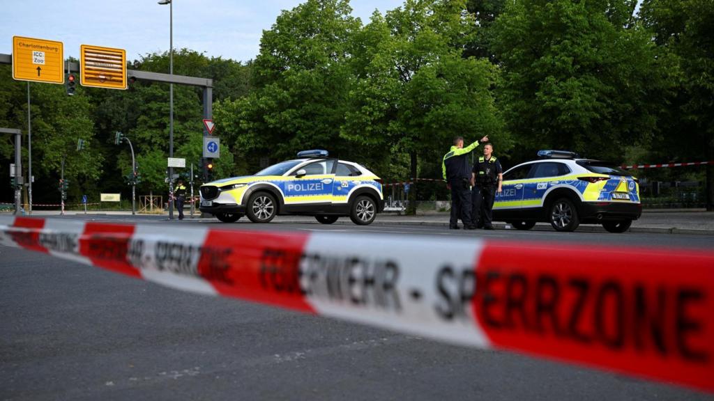 Police secure the area at Tiergarten park after a deadly incident in which a vehicle crashed into a crowd near Berlin's annual Christopher Street Day Pride parade on Saturday evening