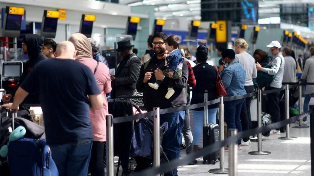 People queueing at Heathrow Terminal 5