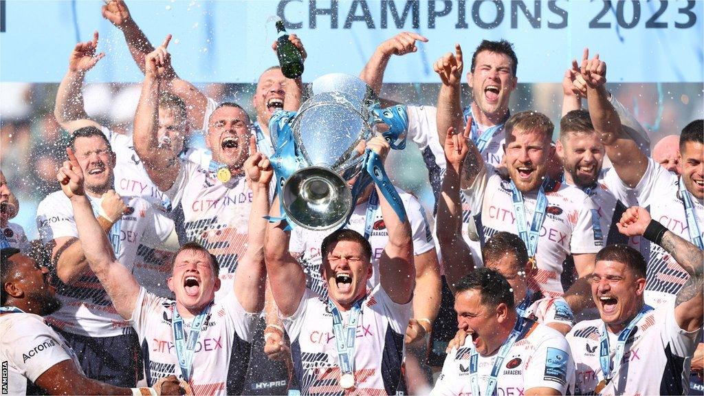 Saracens celebrate with the Premiership trophy