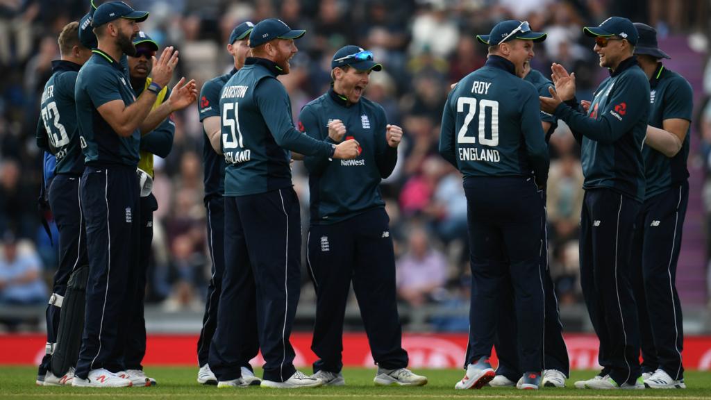 England celebrate a wicket