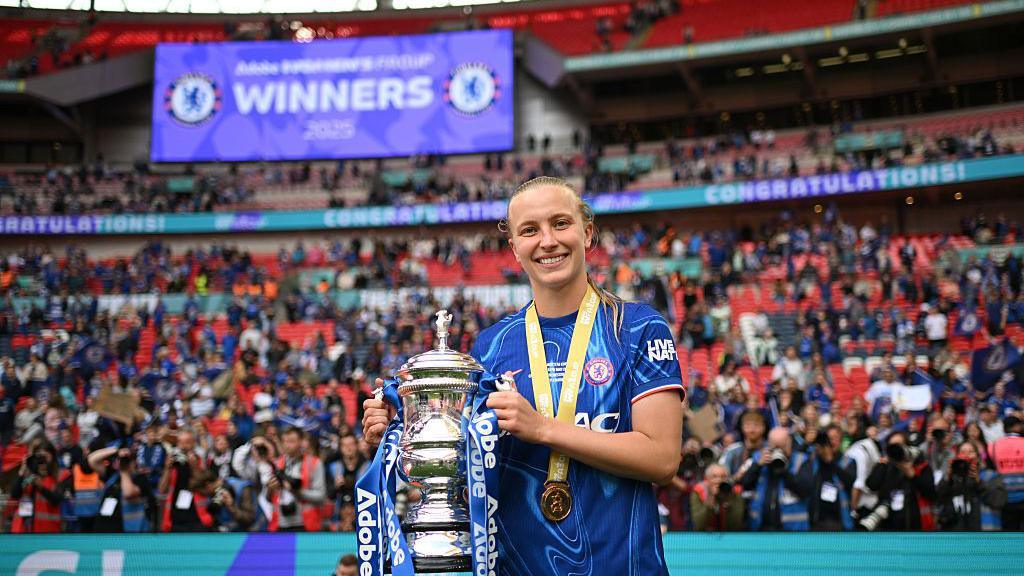 Aggie Beever-Jones holding the FA Cup last month.