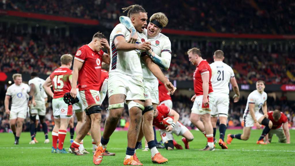 Henry Pollock and Chandler Cunningham South celebrate