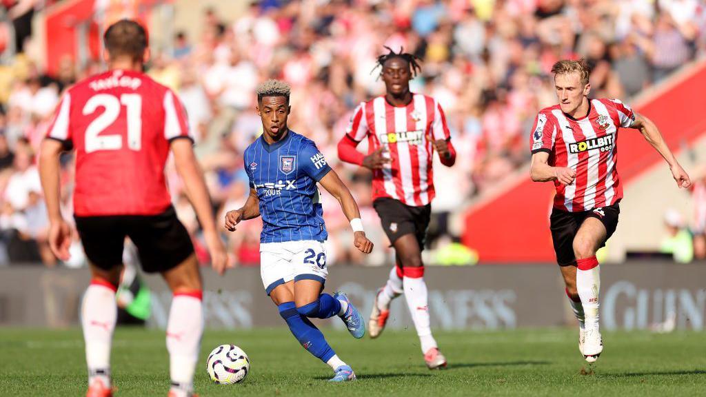 Omari Hutchinson of Ipswich runs with the ball during the Premier League match between Southampton FC and Ipswich Town FC at St Mary's Stadium 