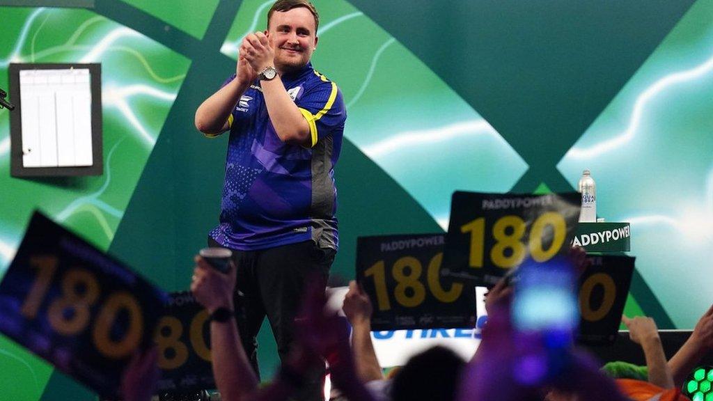 Luke Littler celebrating his win over Raymond van Barneveld