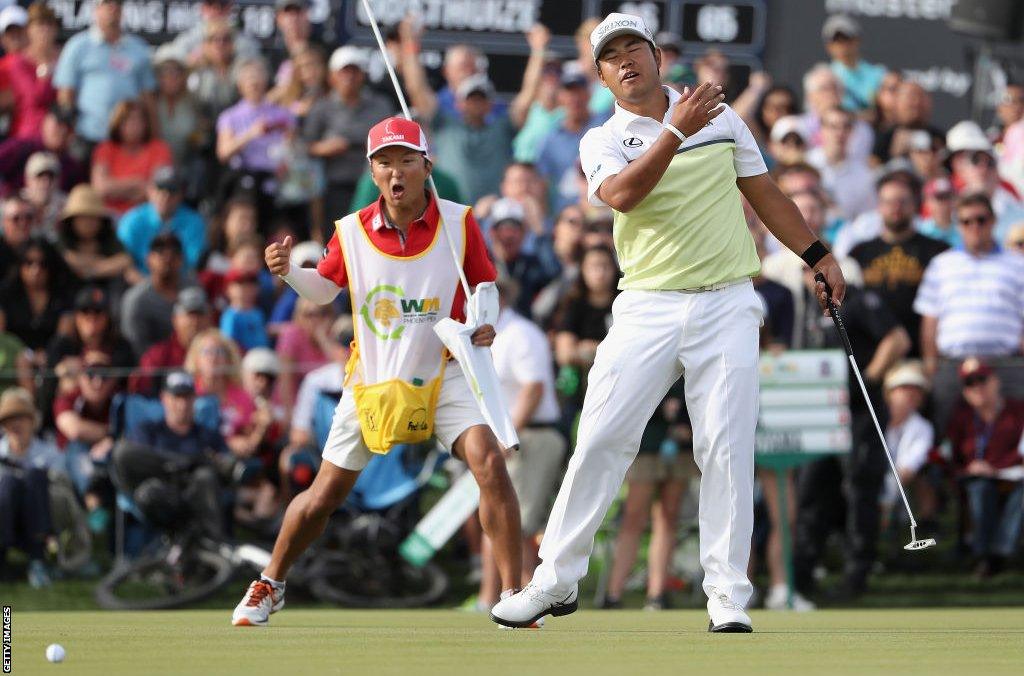 Hideki Matsuyama misses a putt on the 18th