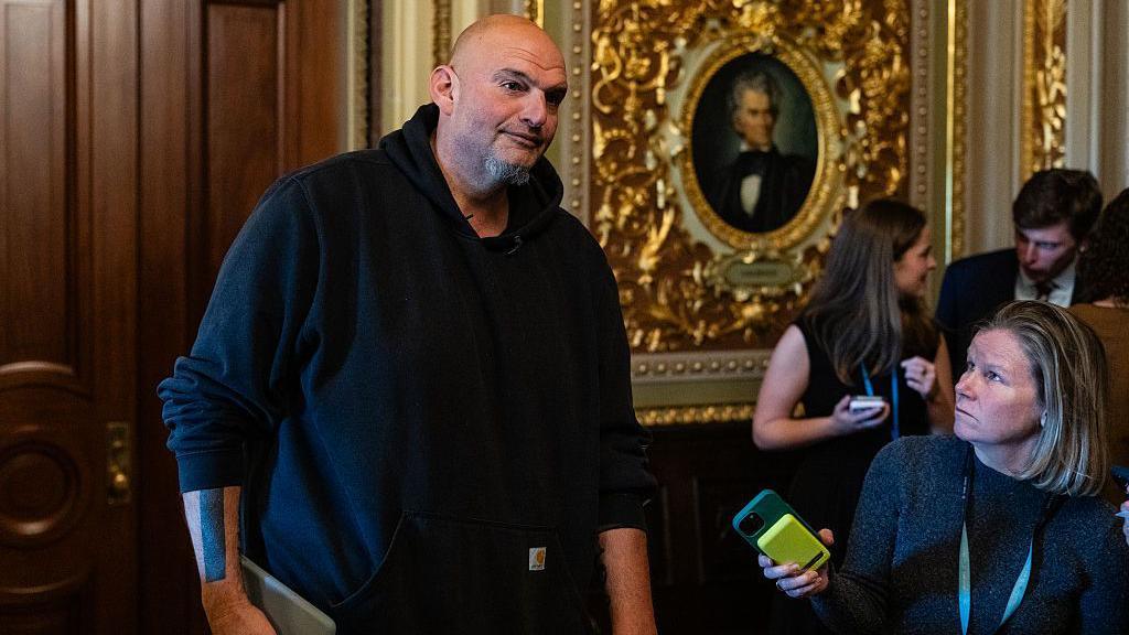 Senator John Fetterman departs a Democratic luncheon at the US Capitol