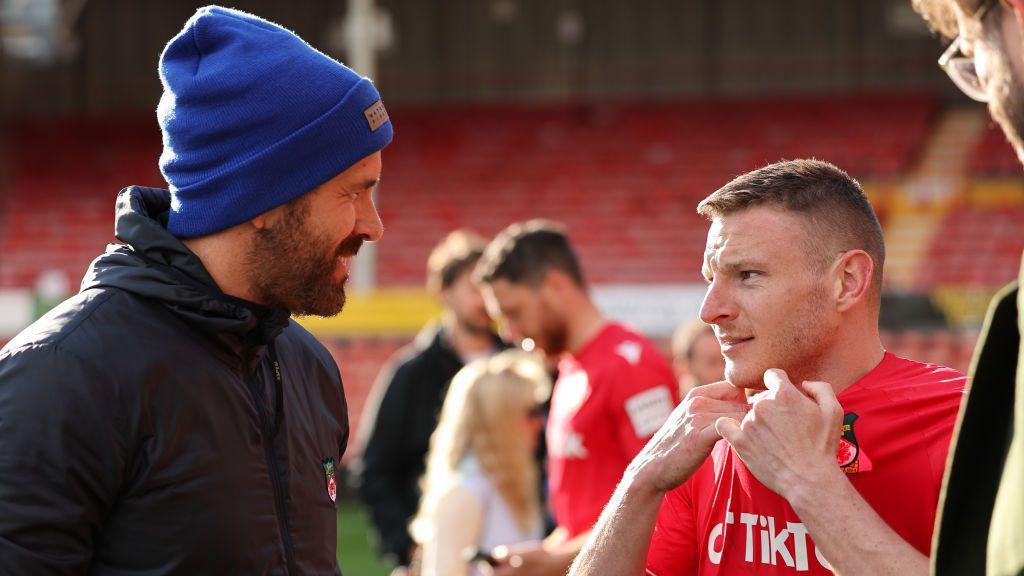 Actor Ryan Reynolds and footballer Paul Mullin.