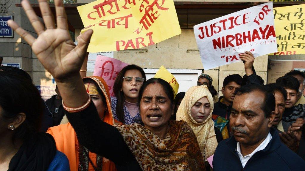 The victim's mother, Asha Devi, at protests