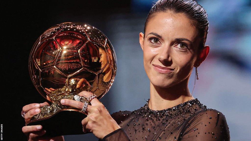 Aitana Bomati holds the Ballon D'Or trophy won