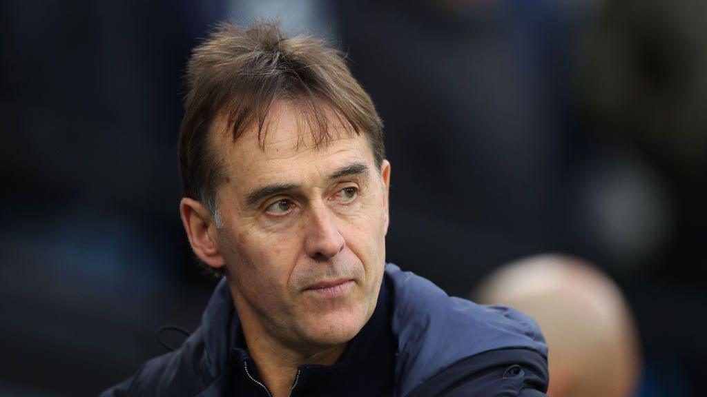 Julen Lopetegui looks on