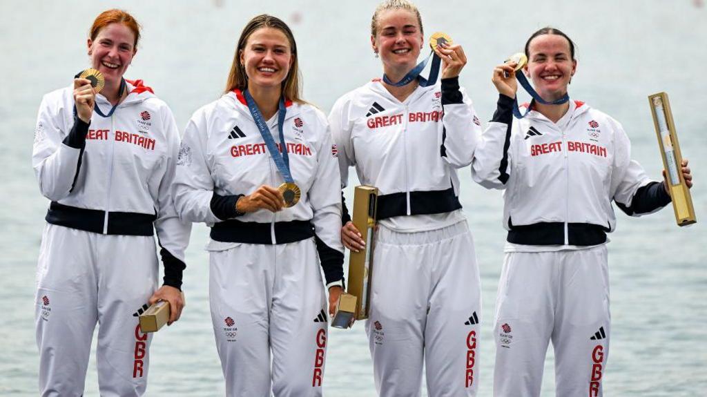 Georgina Brayshaw, Lola Anderson, Hannah Scott and Lauren Henry, with their gold medals after winning the women's quadruple sculls final a