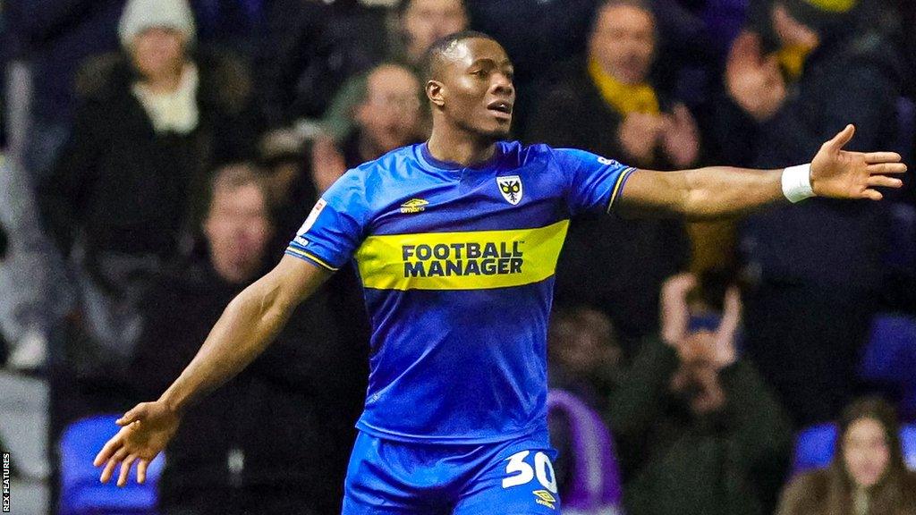 Wimbledon defender Paul Kalambayi