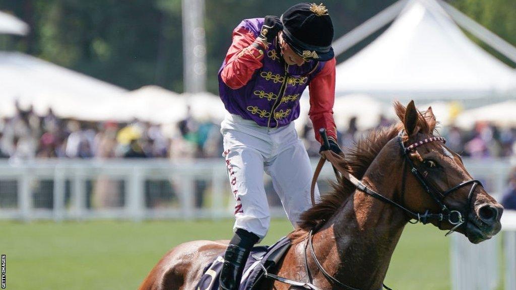 Tom Marquand celebrates with Desert Hero after winning the King George V Stakes at Royal Ascot