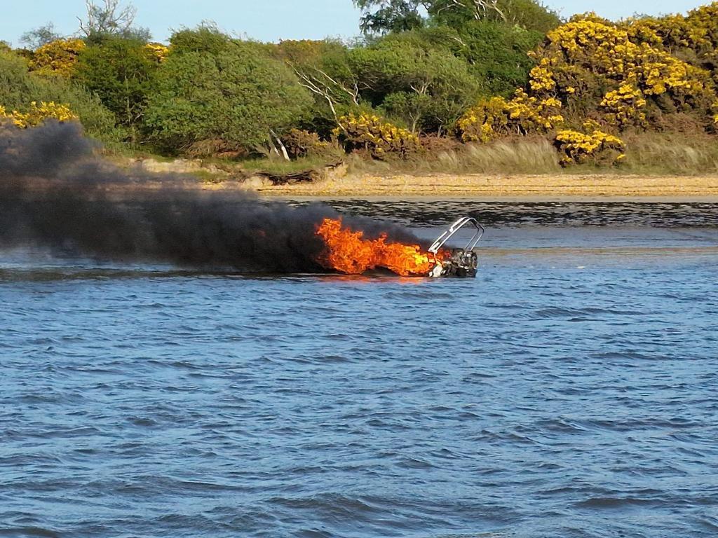 the boat on fire in the water