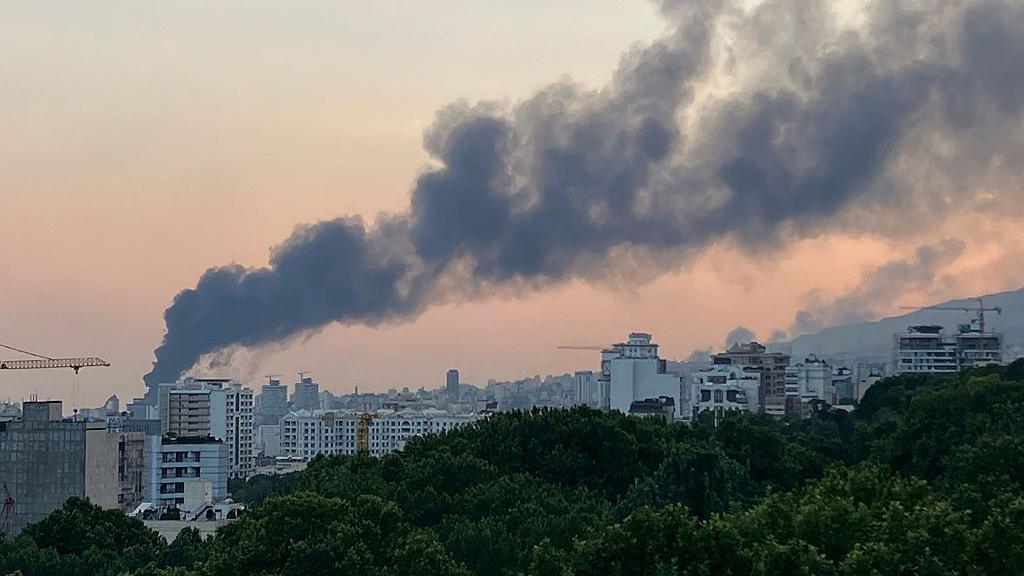 Smoke billows following an Israeli air strike on the Islamic Republic of Iran Broadcasting (IRIB) building in Tehran, Iran (16 June 2025)