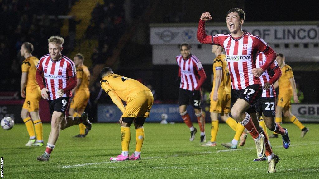 Lincoln City's Dylan Duffy celebrates scoring against Cambridge