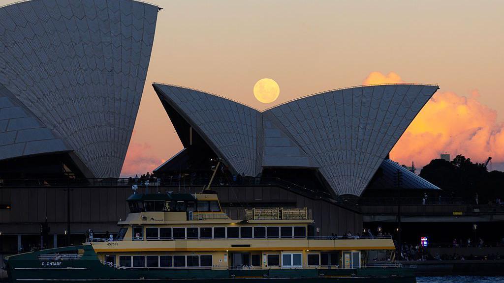 SYDNEY, AUSTRALIA - MAY 31: Tonight's full moon is a rare micromoon and blue moon seen rising behind the Sydney Opera House on May 31, 2026 in Sydney, Australia. (Photo by Steve Christo - Corbis/Corbis via Getty Images)