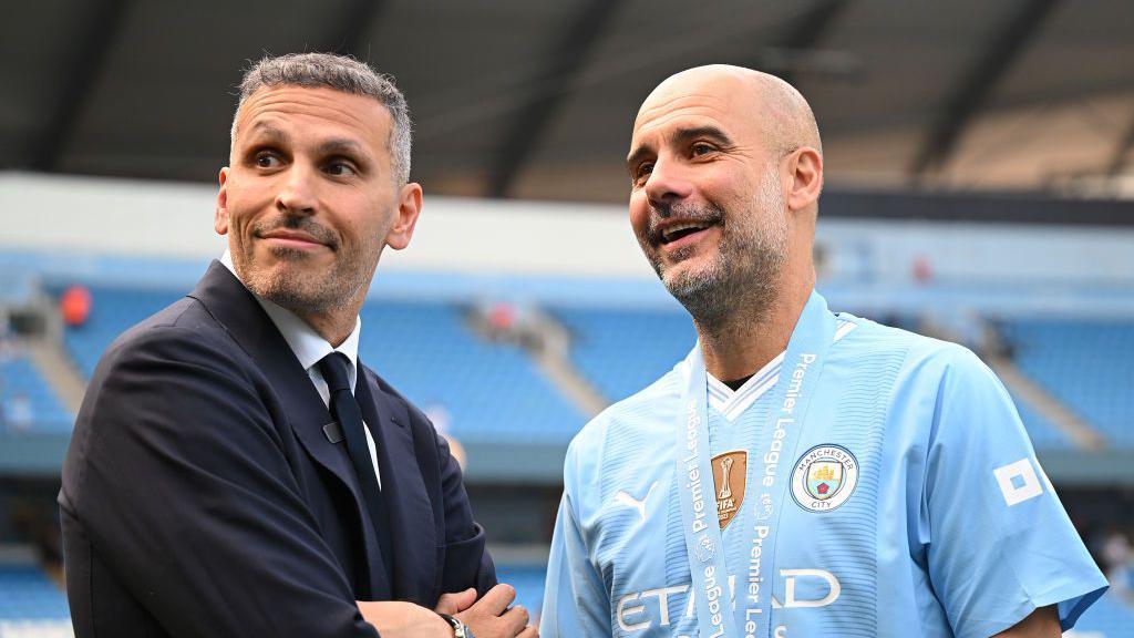 Khaldoon Al Mubarak, Chairman of Manchester City, and Pep Guardiola at Etihad Stadium.