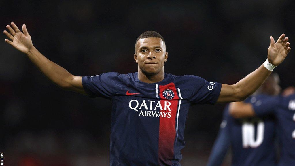 Paris St Germain's Kylian Mbappe celebrates scoring their second goal