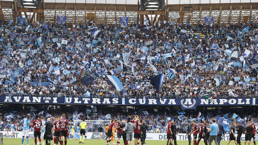 Napoli players applaud their fans at full-time after drawing with Salernitana