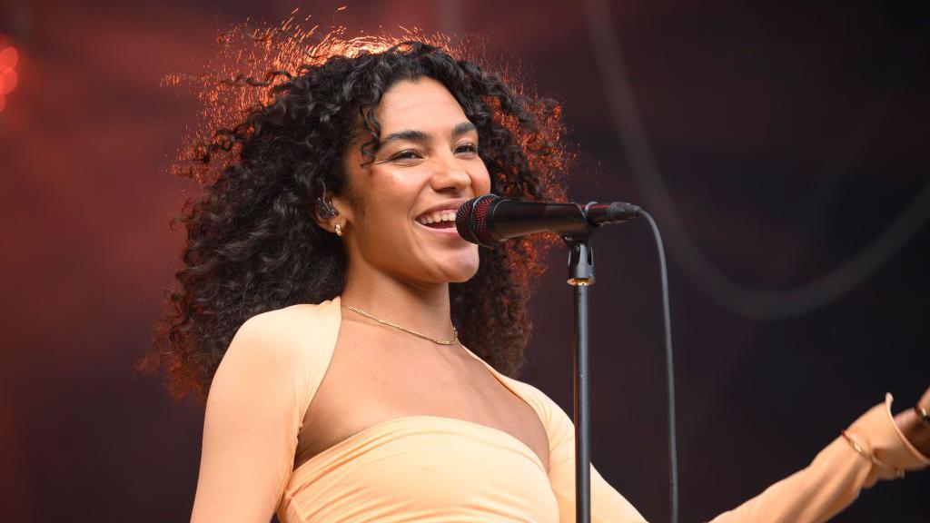 Olivia Dean performs during the Rock en Seine Festival.