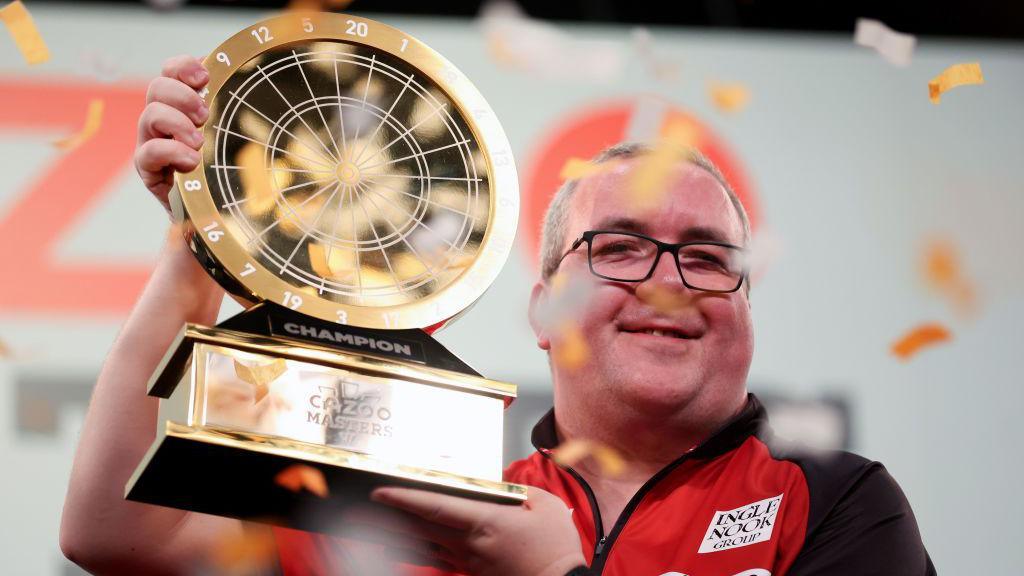 Stephen Bunting celebrates after winning the Cazoo Masters final in February