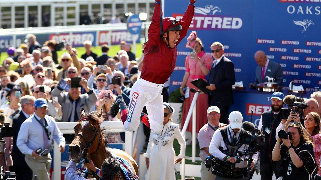 Frankie Dettori leaps off Soul Sister as he celebrates winning the Oaks at Epsom in 2023