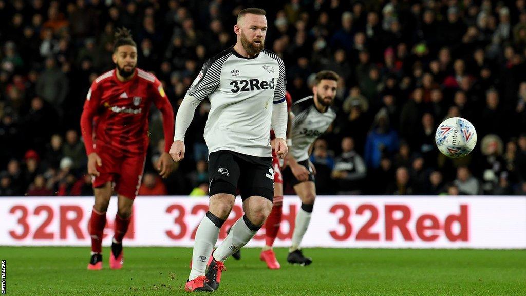 Wayne Rooney scoring a penalty for Derby