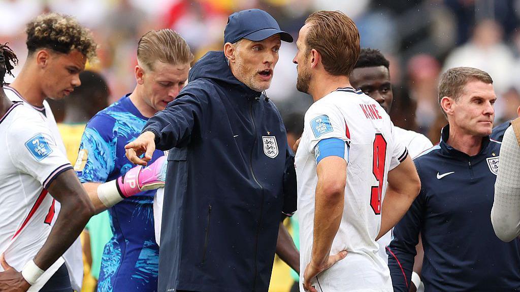 Thomas Tuchel, Manager of England, speaks to Harry Kane #9 of England at the hydration break during the FIFA World Cup 2026 Group L match between England and Ghana at Boston Stadium on June 23, 2026 in Foxborough, Massachusetts. (Photo by Richard Pelham/Getty Images)