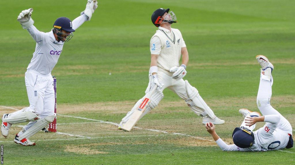 Ollie Pope takes a catch to dismiss Henry Nicholls