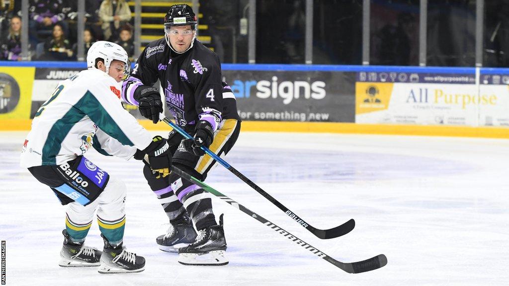 Action between Belfast Giants and Nottingham Panthers