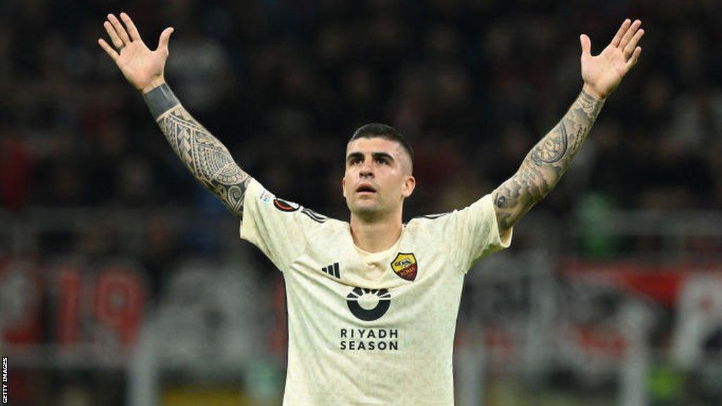 Gianluca Mancini celebrates.