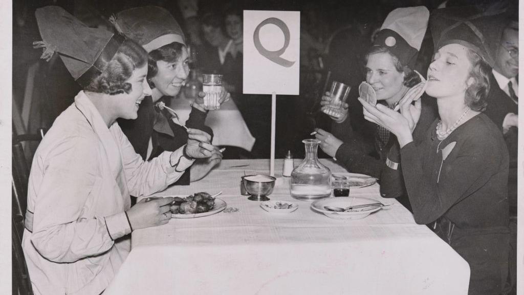 Shop Girls ' Xmas Party, In spite of the rush of business the staff of Whiteleys today enjoyed a cafeteria Christmas party.  