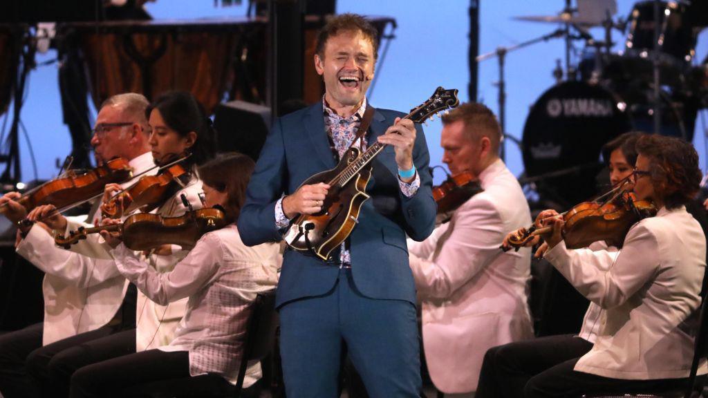 Chris Thile performing on stage