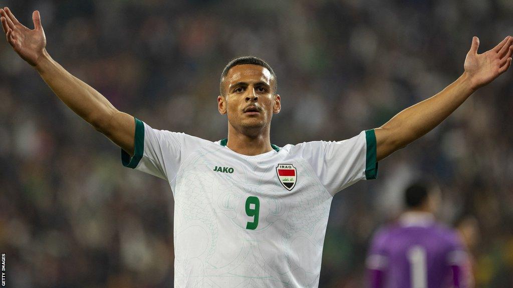 Ali Al-Hamadi celebrates scoring for Iraq