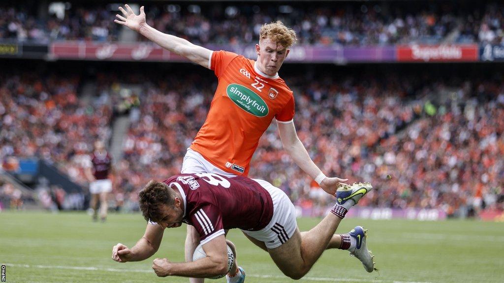 Armagh's Conor Turbitt challenges Galway's Paul Conroy in last year's All-Ireland quarter-final at Croke Park