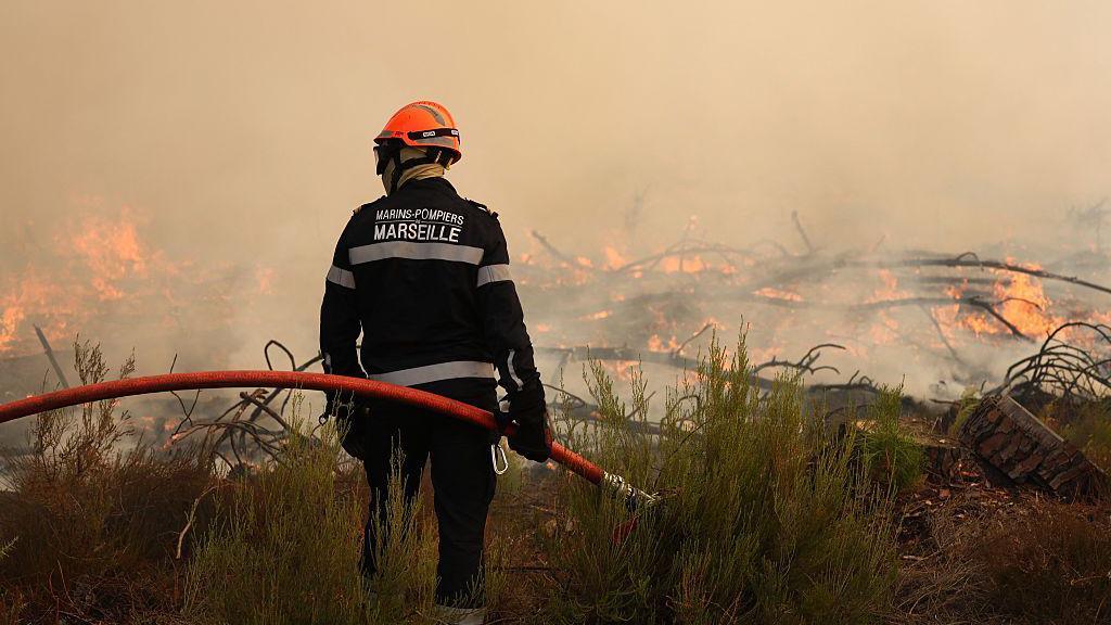 Firefighters battle wildfire as tens of thousands evacuated near Bordeaux