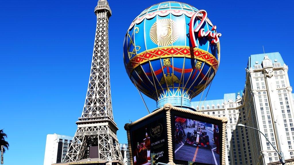 A big screen at Paris Las Vegas shows Formula 1 cars racing