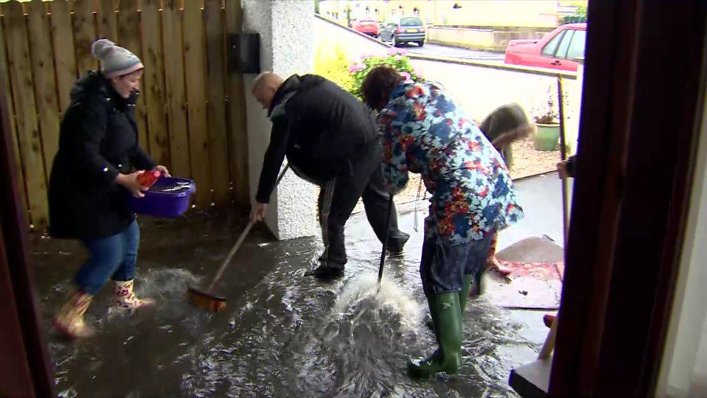 Homes in Muckamore, County Antrim, have been damaged by flooding