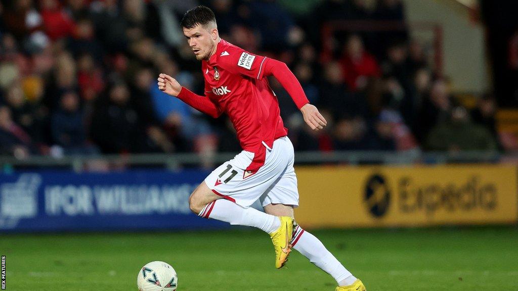 Liam McAlinden attacks for Wrexham