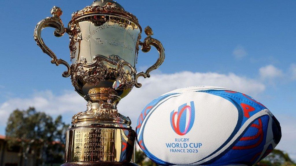 The Webb Ellis Cup trophy and the Gilbert Rugby World Cup 2023 Rugby ball