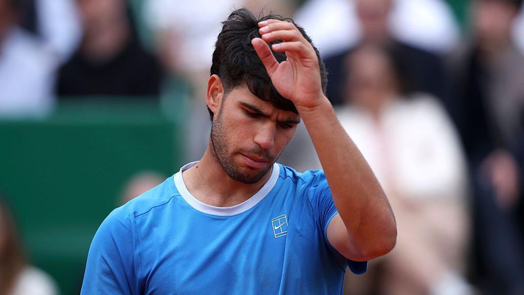 Carlos Alcaraz looking glum faced during the Monte Carlo Masters
