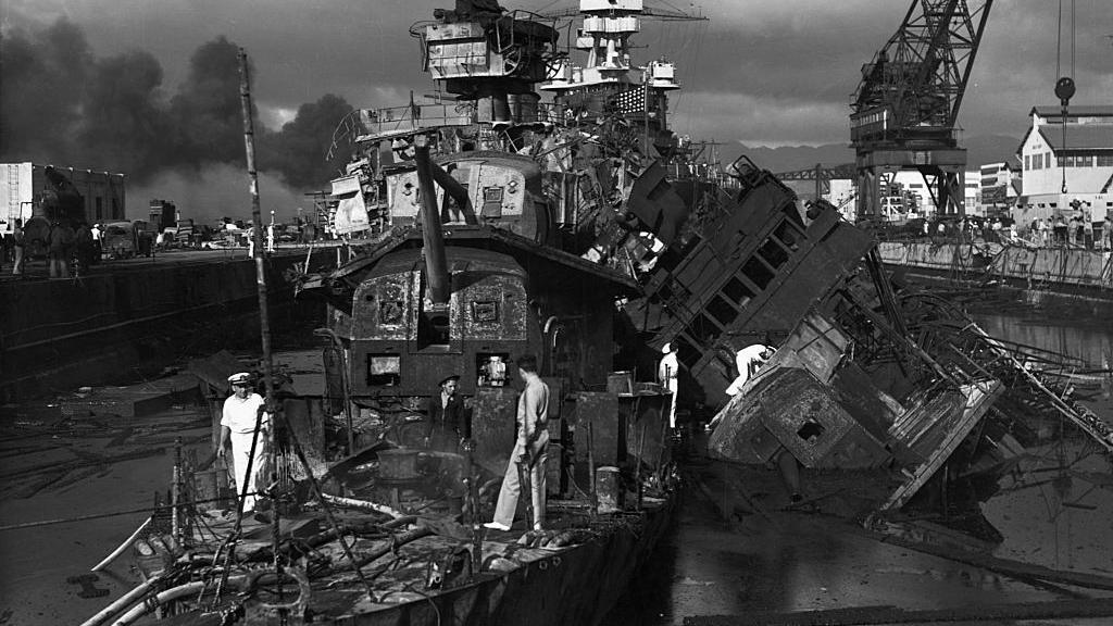 Badly damaged US warships after the Japanese attack on Pearl Harbor.