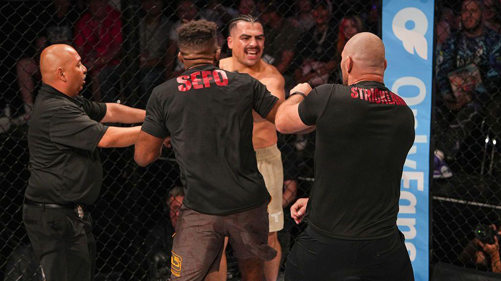 Chris Curtis and Sean Strickland confront Luis Hernandez