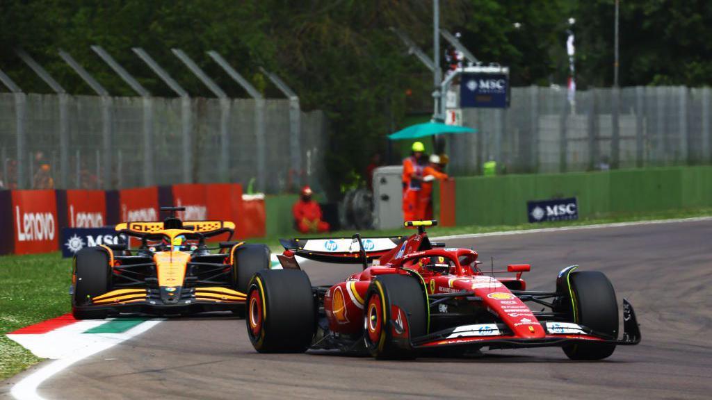 Carlos Sainz in front of Oscar Piastri during the Emiliano Romagna Grand Prix